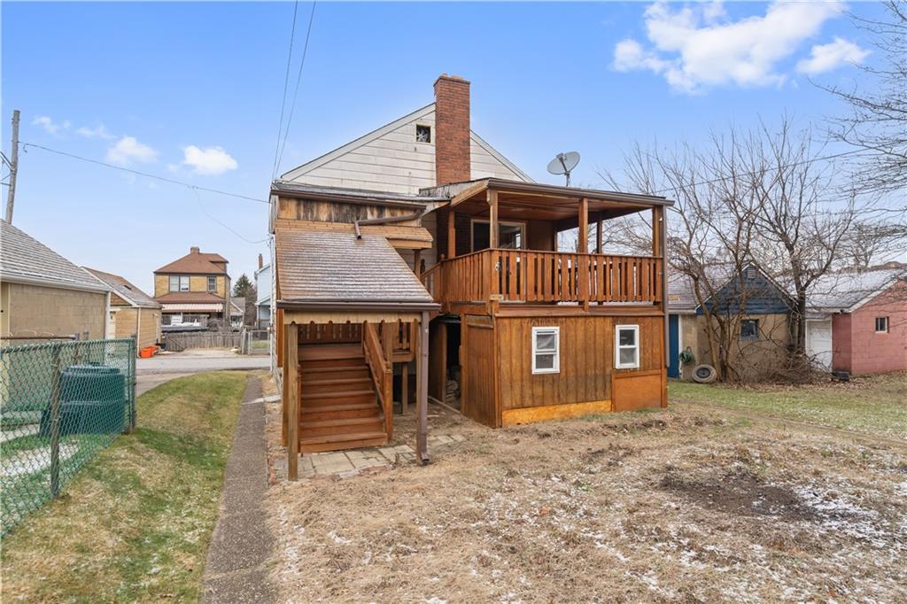 230 West Marigold Street Homestead, PA 15120 - Photo 24 of 50 a front view of a house with a yard