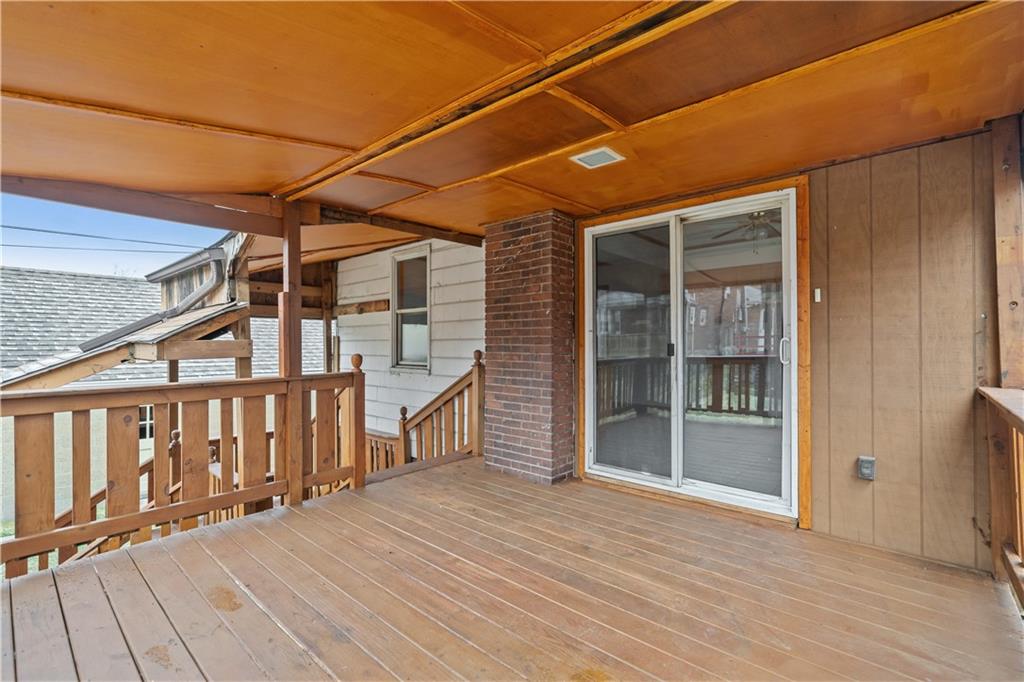 230 West Marigold Street Homestead, PA 15120 - Photo 27 of 50 a view of a balcony with wooden floor