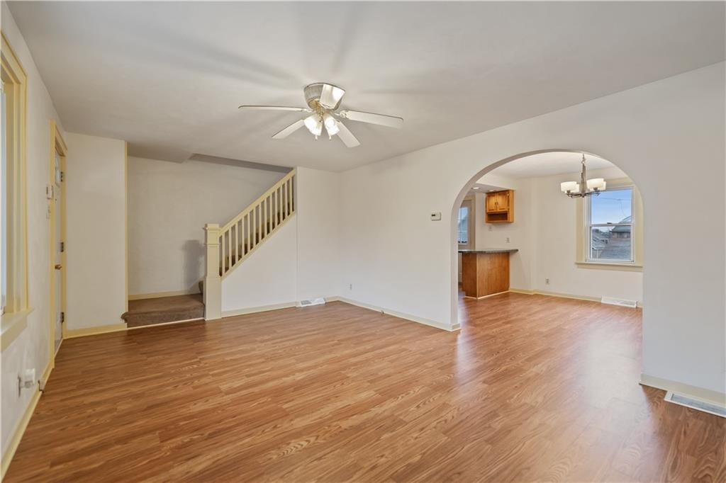 230 West Marigold Street Homestead, PA 15120 - Photo 5 of 50 a view of empty room with wooden floor