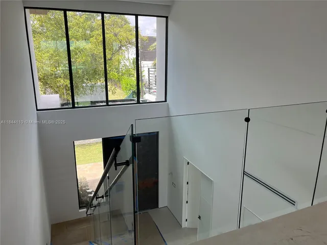 a view of a room with a window