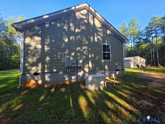 3125 Abilene Road Farmville, VA 23901 - Photo 15 of 17 Exterior siding with a window, a generator, and el