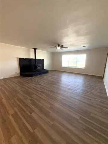 a kitchen with stainless steel appliances a sink and a refrigerator