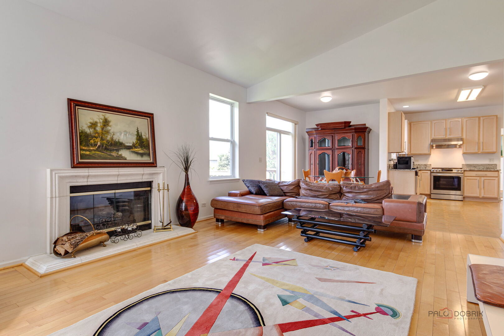2227 Trailside Lane Wauconda, IL 60084 - Photo 13 of 37 a living room with furniture a fireplace and a flat screen tv