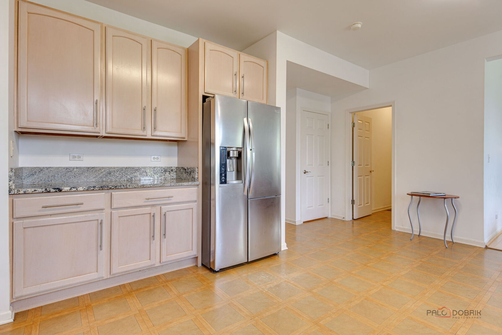 2227 Trailside Lane Wauconda, IL 60084 - Photo 20 of 37 a kitchen with a refrigerator sink and cabinets