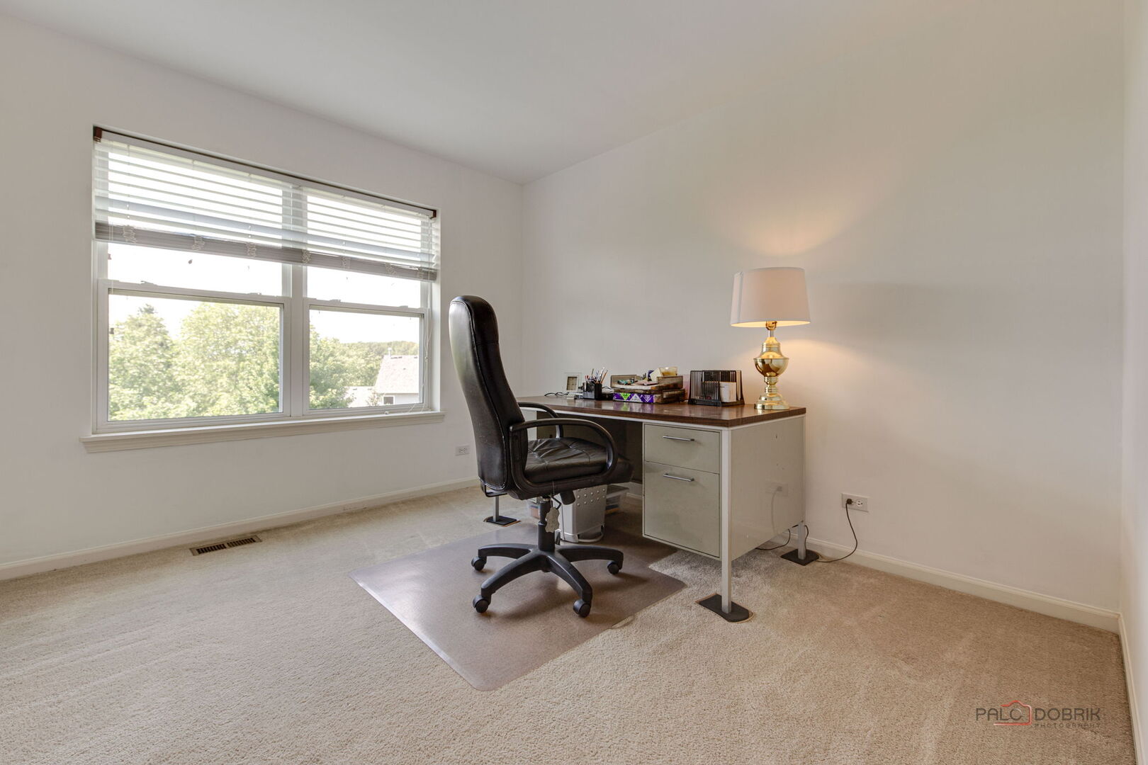 2227 Trailside Lane Wauconda, IL 60084 - Photo 28 of 37 a view of a workspace with furniture and a window