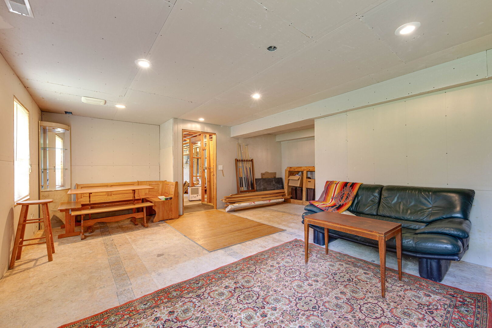 2227 Trailside Lane Wauconda, IL 60084 - Photo 33 of 37 a living room with furniture and a rug