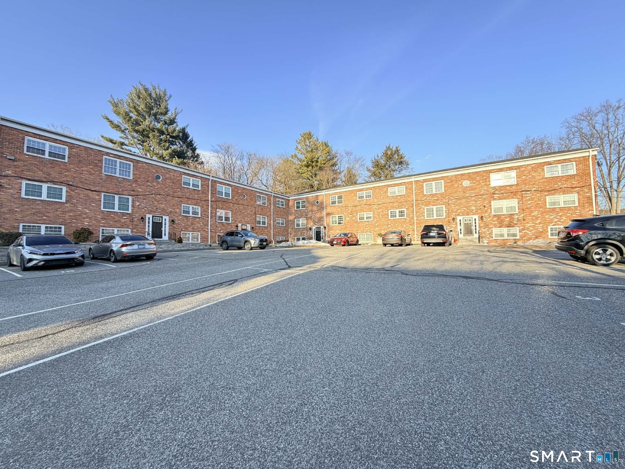 12 Terrace Place, Unit 2 New Milford, CT 06776 - Photo 1 of 11 a view of a street with cars