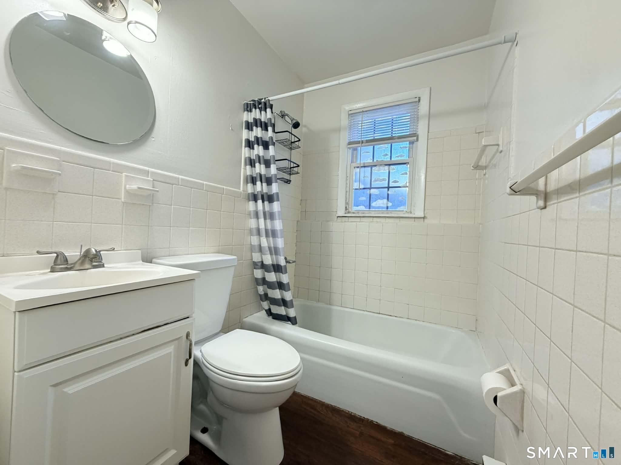 12 Terrace Place, Unit 2 New Milford, CT 06776 - Photo 10 of 11 a bathroom with a sink a toilet and shower