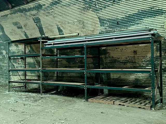 a view of a wooden bench sitting in front of a house