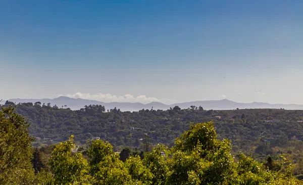a view of city and mountain