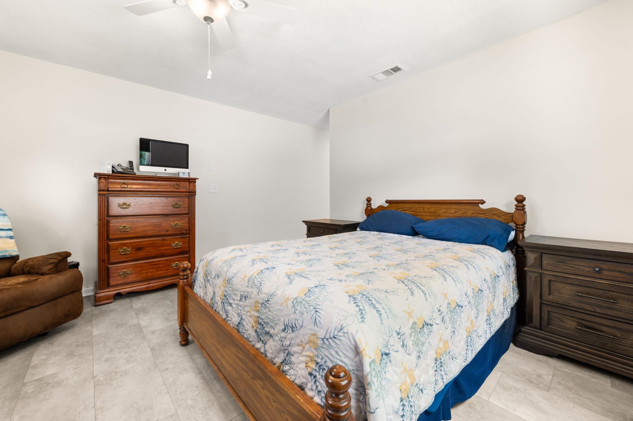 507 Gentian Road St. Augustine, FL 32086 - Photo 33 of 82 a bedroom with a bed and furniture
