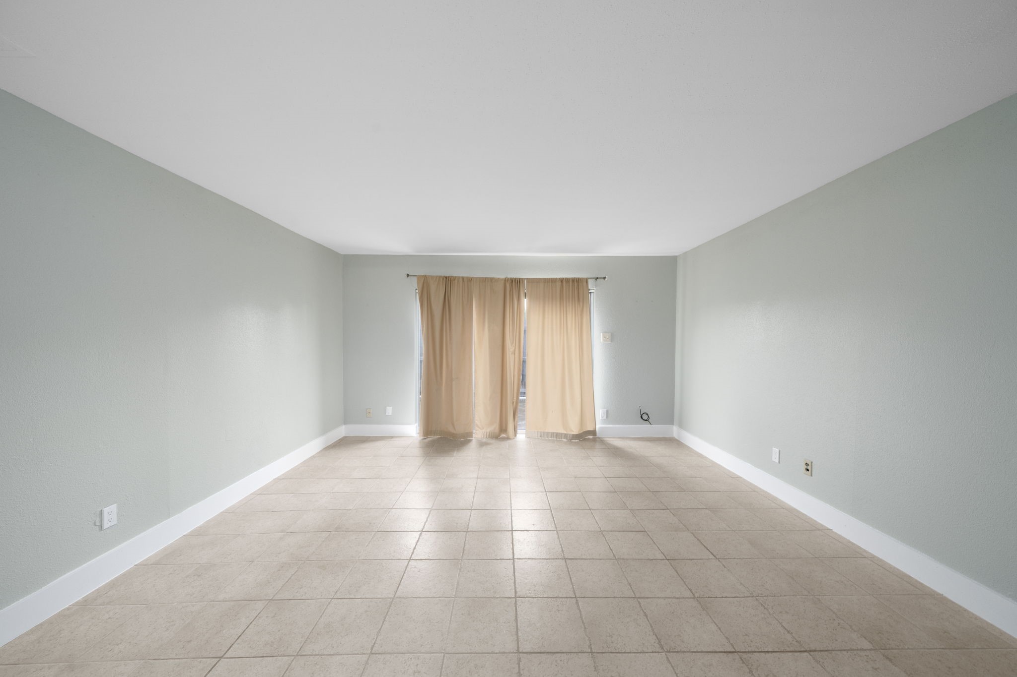 11550 Chimney Rock Road, Unit 521 Houston, TX 77035 - Photo 12 of 30 a view of an empty room with a window