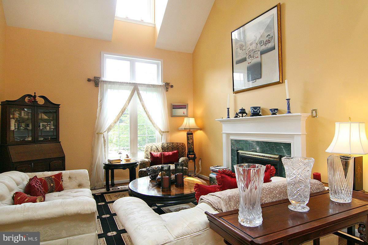 2560 Bear Den Road Frederick, MD 21701 - Photo 7 of 30 a living room with furniture and a fireplace