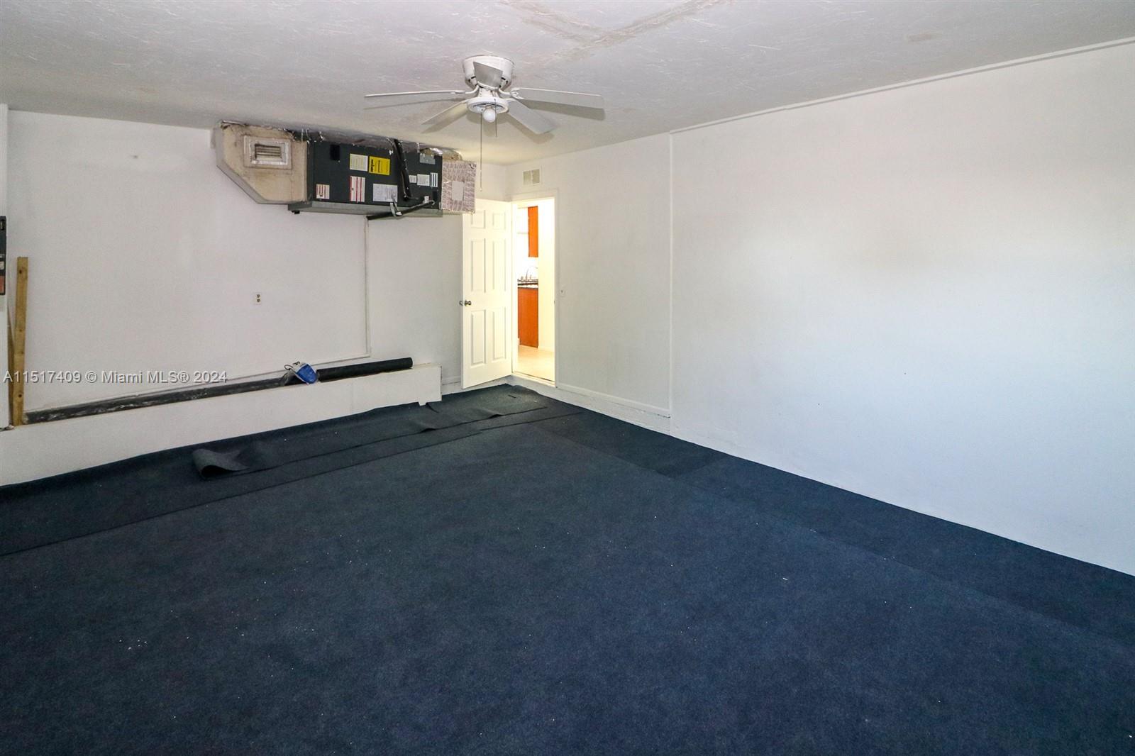 2139 Delta Street Port Charlotte, FL 33952 - Photo 18 of 43 en empty room with windows