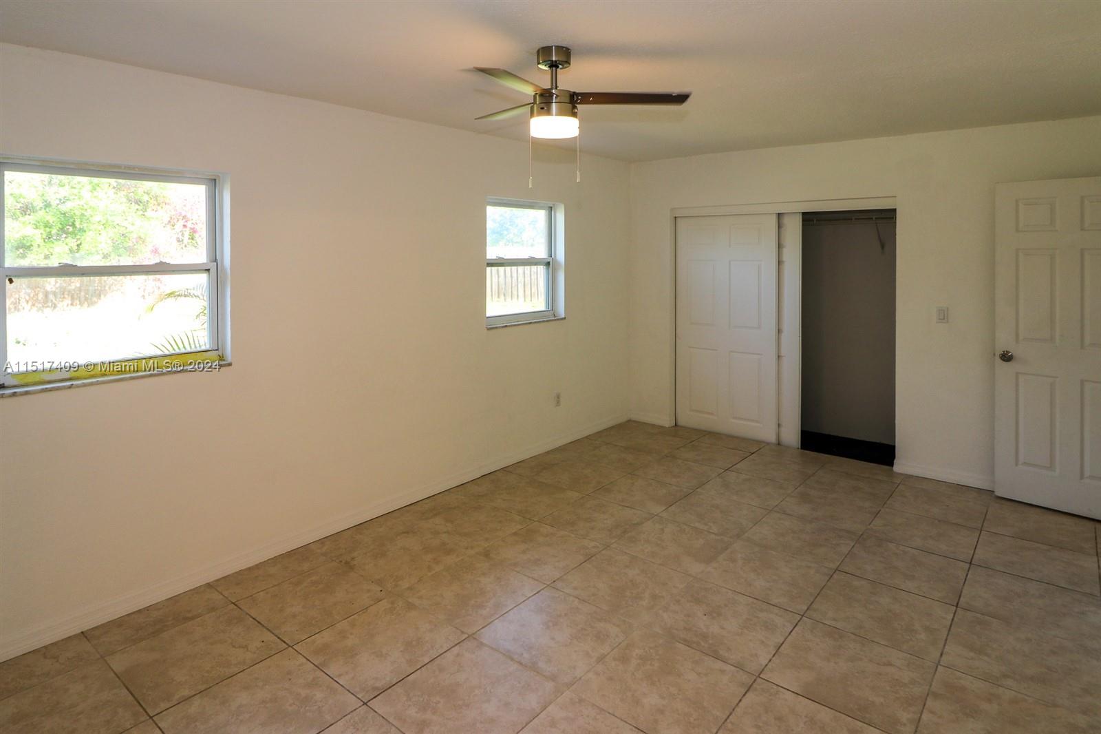 2139 Delta Street Port Charlotte, FL 33952 - Photo 23 of 43 a view of an empty room with a window