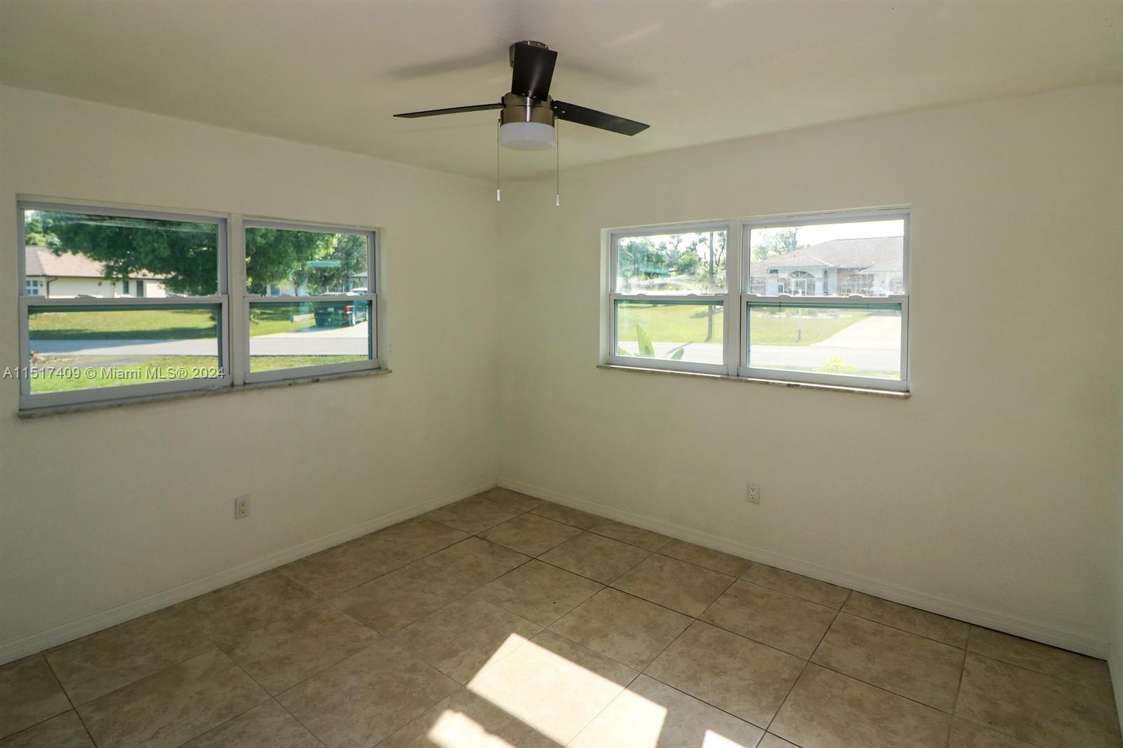 2139 Delta Street Port Charlotte, FL 33952 - Photo 28 of 43 a view of an empty room with a window