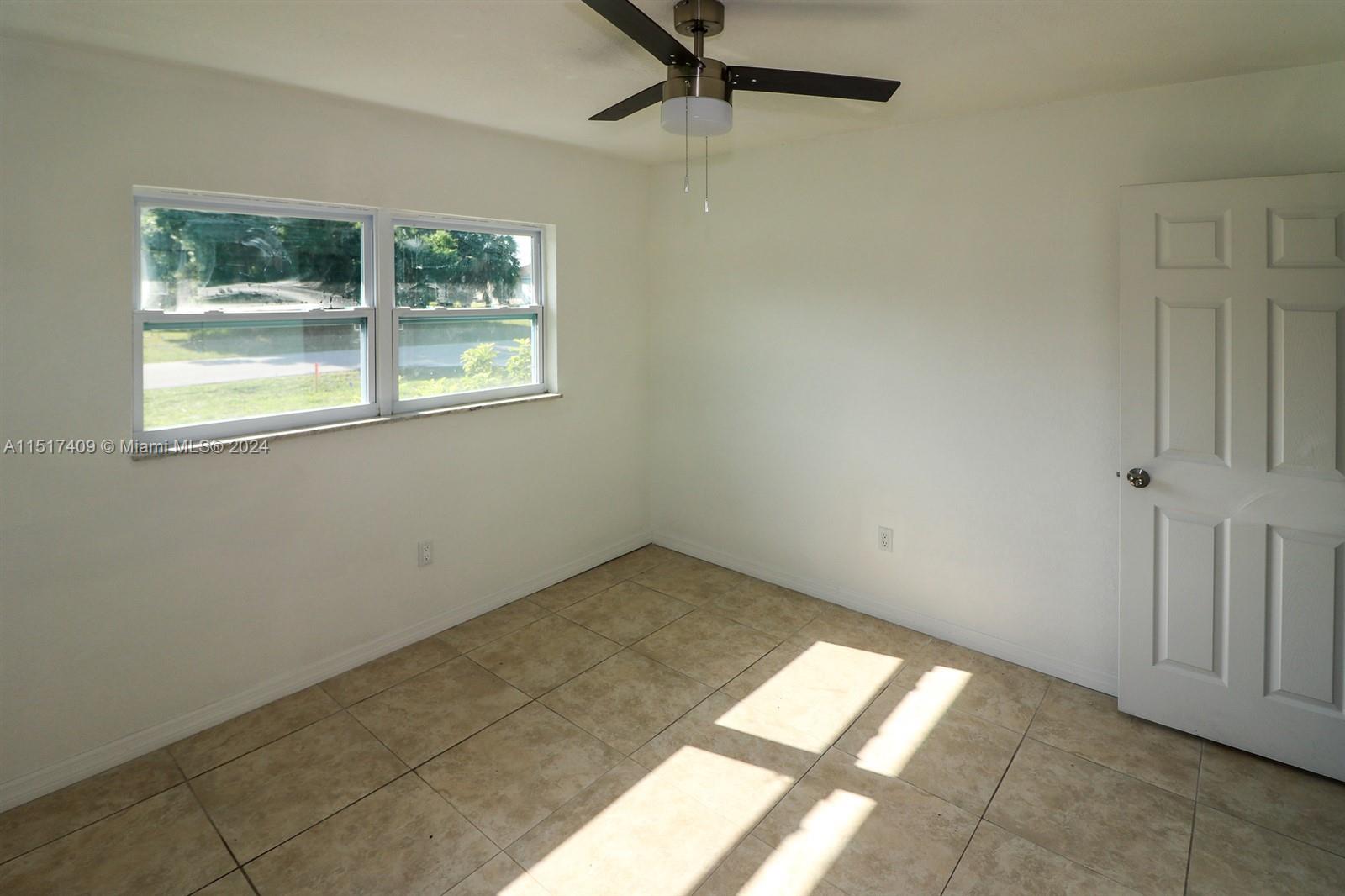 2139 Delta Street Port Charlotte, FL 33952 - Photo 31 of 43 an empty room with windows