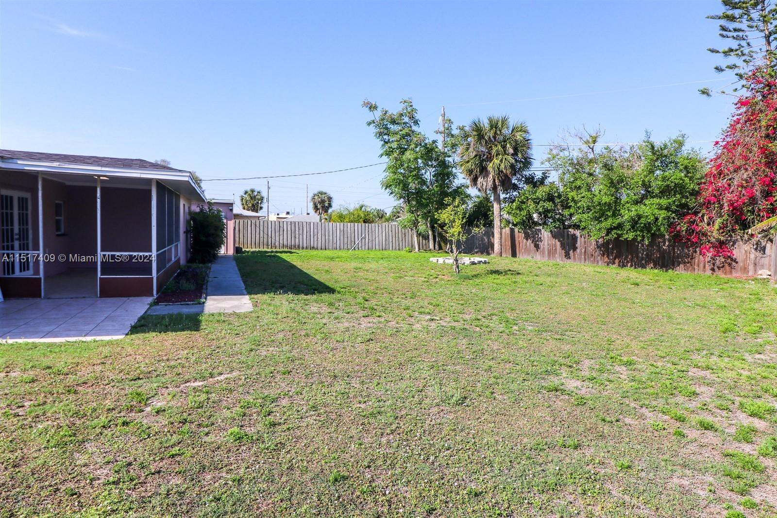 2139 Delta Street Port Charlotte, FL 33952 - Photo 36 of 43 a view of a backyard with garden