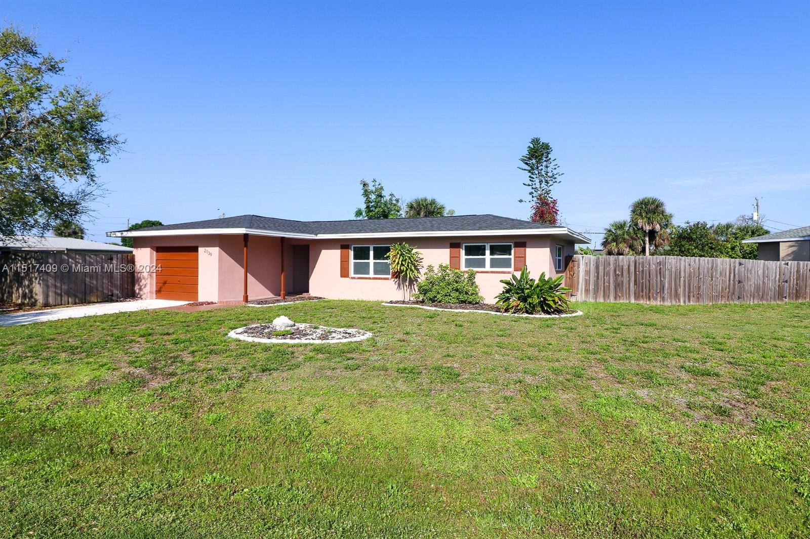 2139 Delta Street Port Charlotte, FL 33952 - Photo 4 of 43 a view of a house with a yard