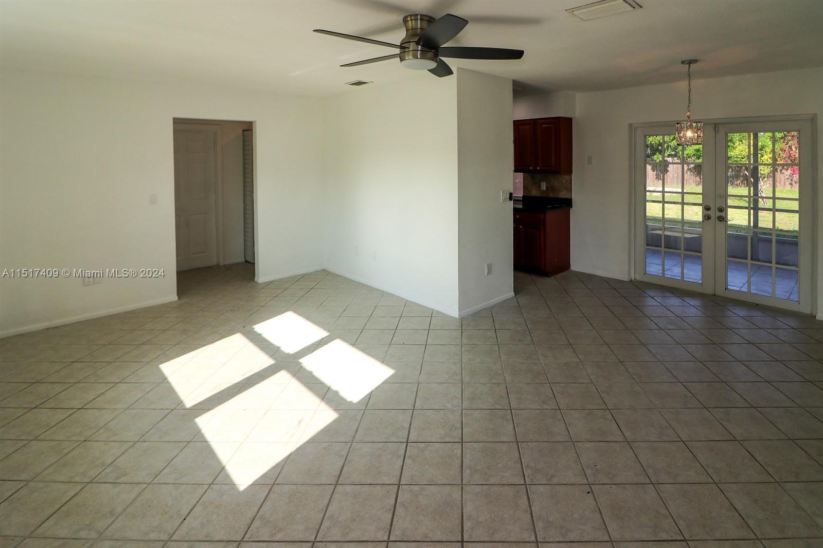 2139 Delta Street Port Charlotte, FL 33952 - Photo 7 of 43 an empty room with windows and closet