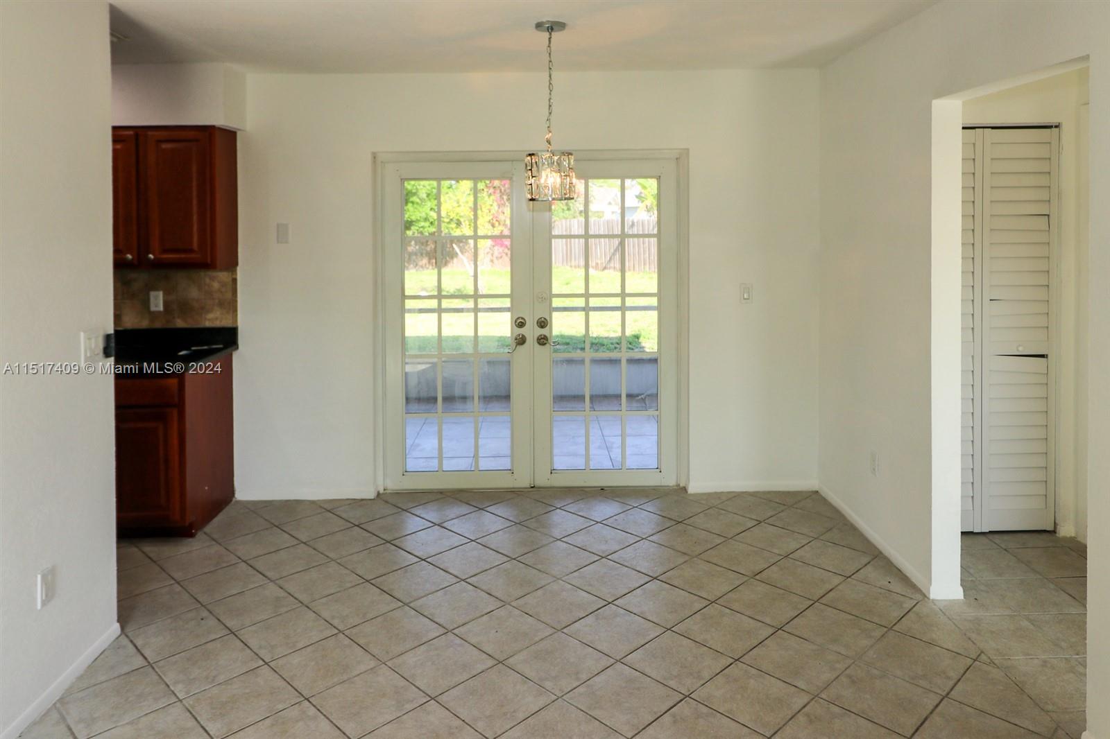 2139 Delta Street Port Charlotte, FL 33952 - Photo 9 of 43 a view of an empty room with window