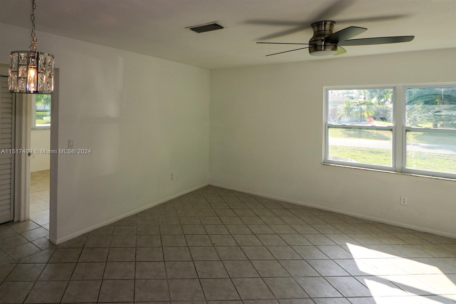 2139 Delta Street Port Charlotte, FL 33952 - Photo 10 of 43 en empty room with windows