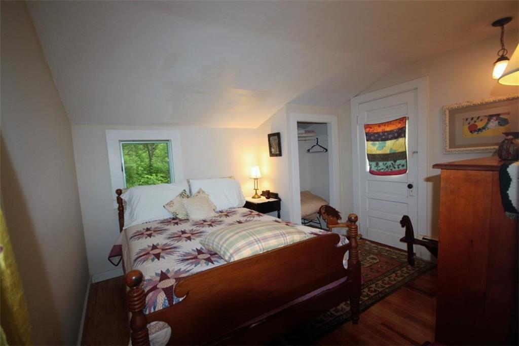 86 Lobster Cove Road Boothbay Harbor, ME 04538 - Photo 12 of 16 The master bedroom with door to...