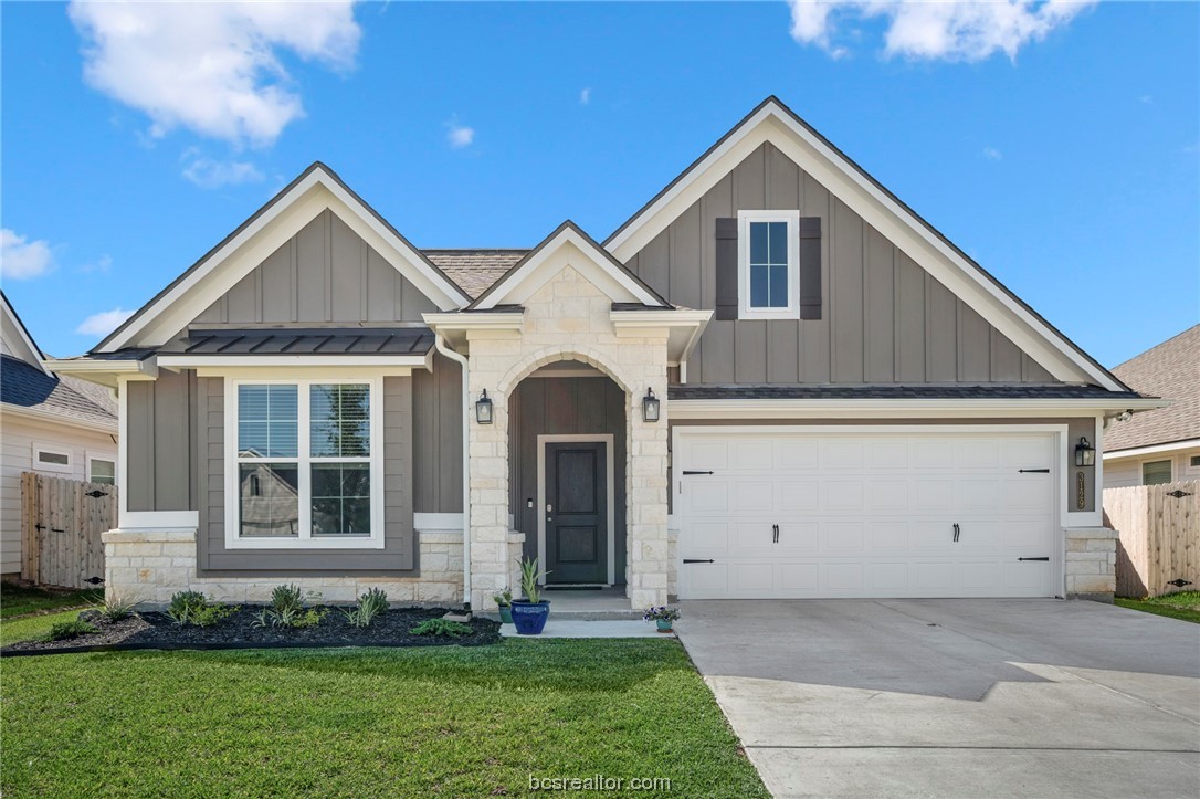 3129 Tarleton Court Bryan, TX 77808 - Photo 1 of 1 a front view of a house with a yard