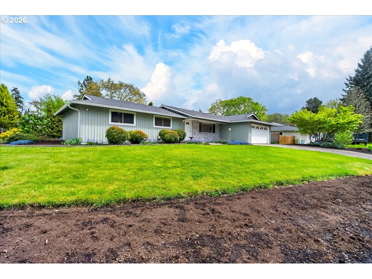 19650 Southwest Jaylee Street Beaverton, OR 97078 - Photo 4 of 46 a view of a house with a yard