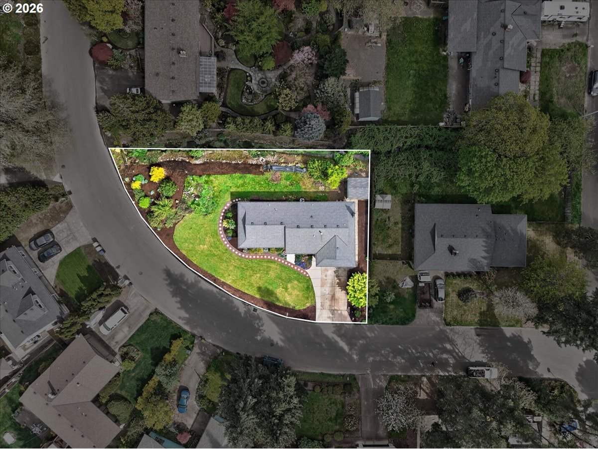 19650 Southwest Jaylee Street Beaverton, OR 97078 - Photo 45 of 46 an aerial view of a house with a garden and a yard