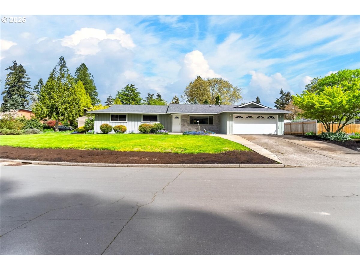 19650 Southwest Jaylee Street Beaverton, OR 97078 - Photo 5 of 46 a view of a house with a yard and street