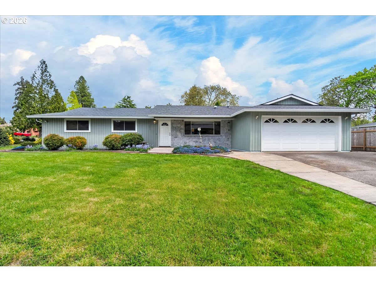 19650 Southwest Jaylee Street Beaverton, OR 97078 - Photo 6 of 46 a front view of house with yard and green space