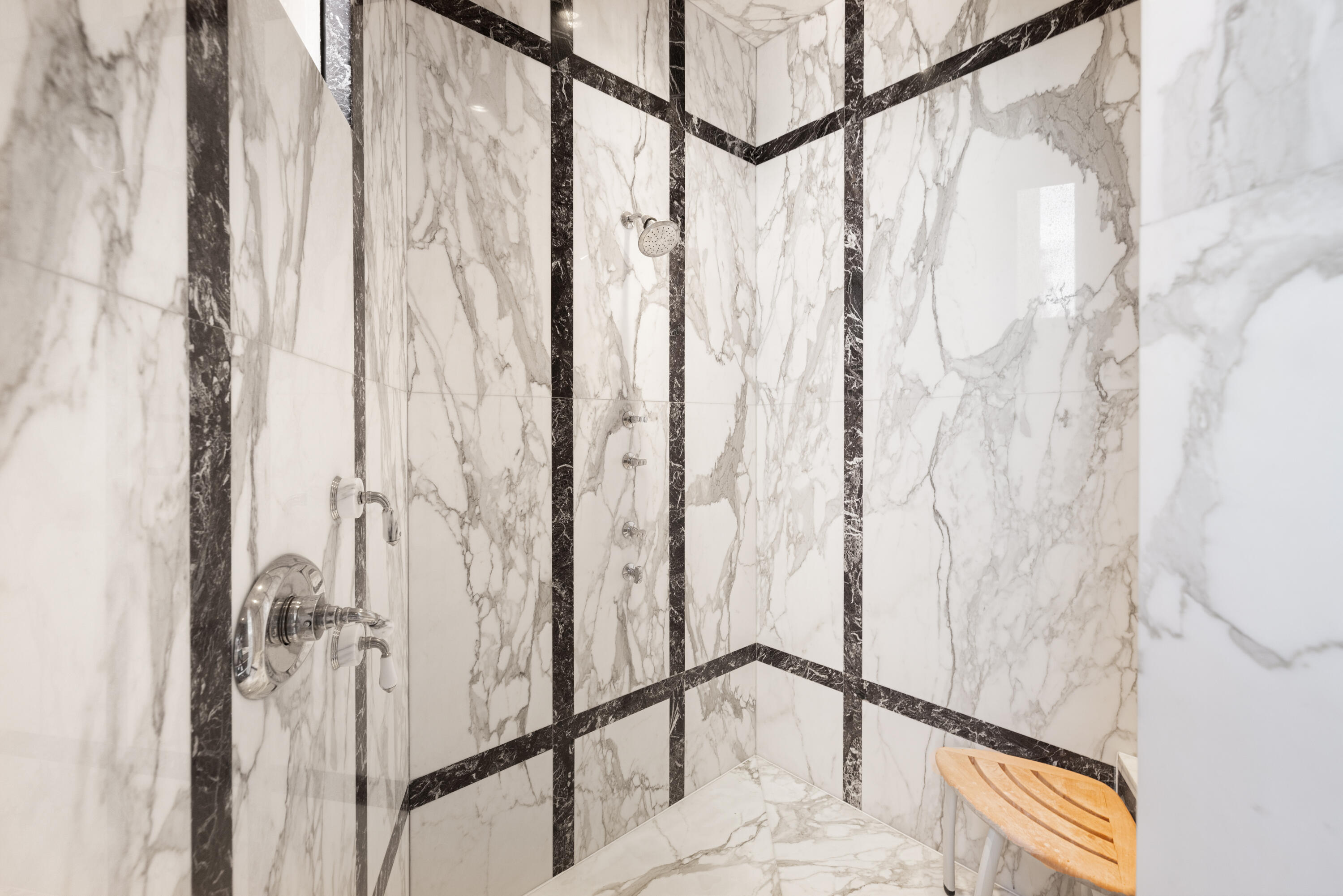 18 Vía Condotti Rancho Mirage, CA 92270 - Photo 16 of 79 a bathroom with a shower and a glass door
