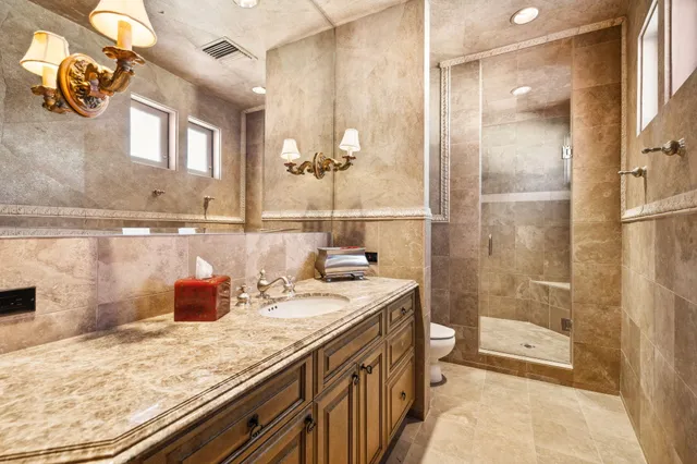 a view of a patio with a dining table and chairs with outer view
