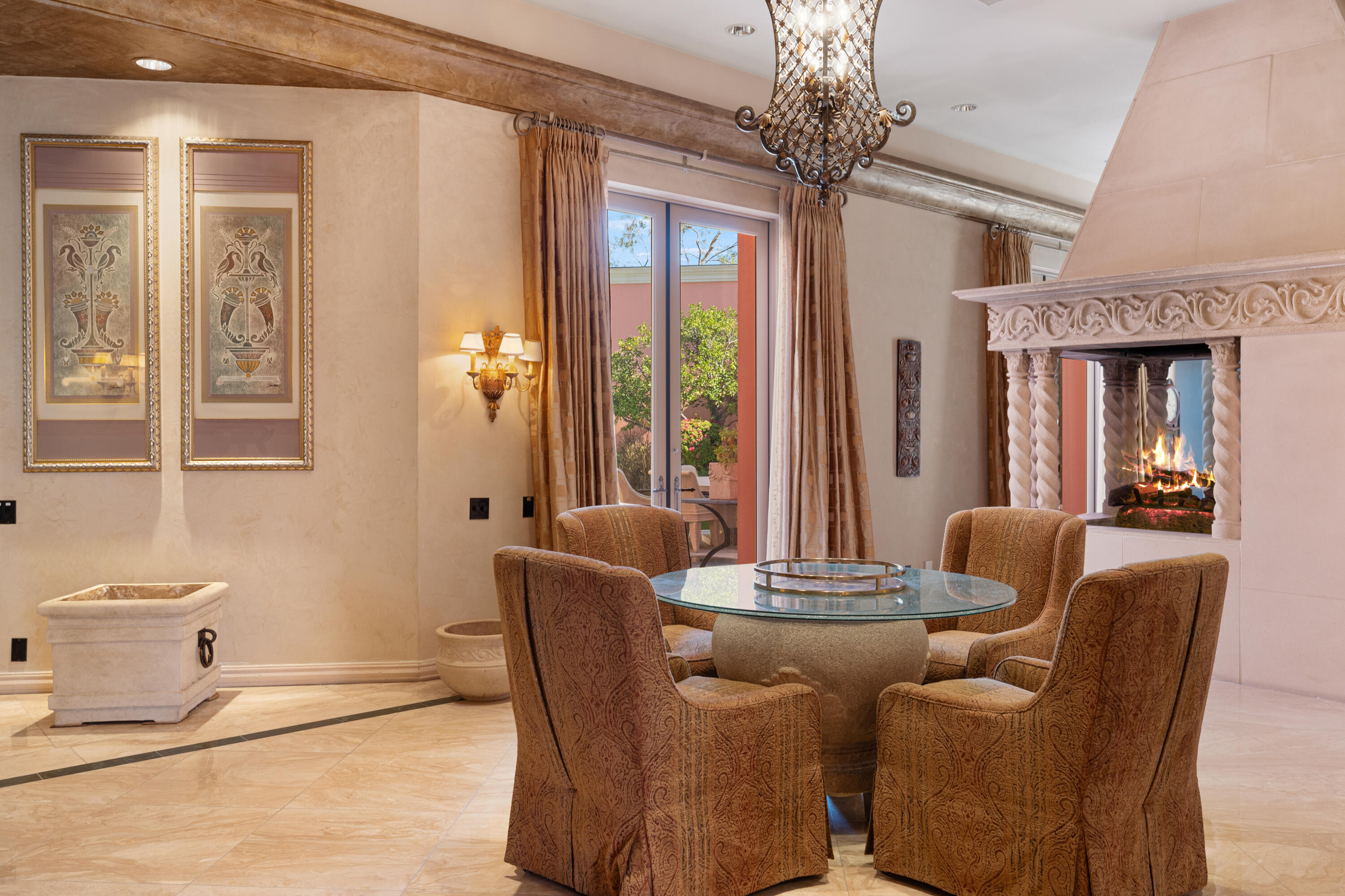 18 Vía Condotti Rancho Mirage, CA 92270 - Photo 22 of 79 a dining room with furniture and window