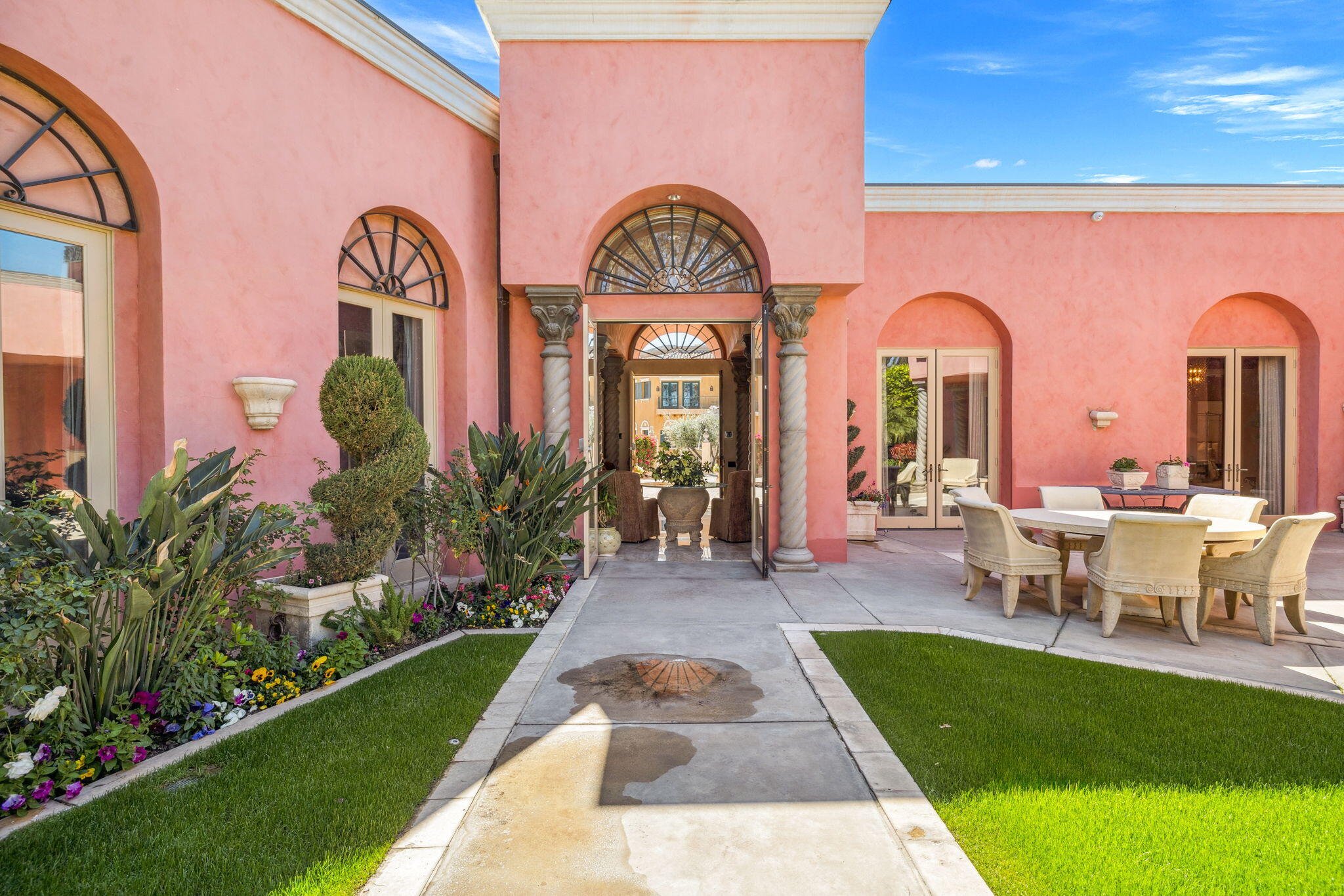 18 Vía Condotti Rancho Mirage, CA 92270 - Photo 3 of 69 a view of a house with a outdoor space porch and patio