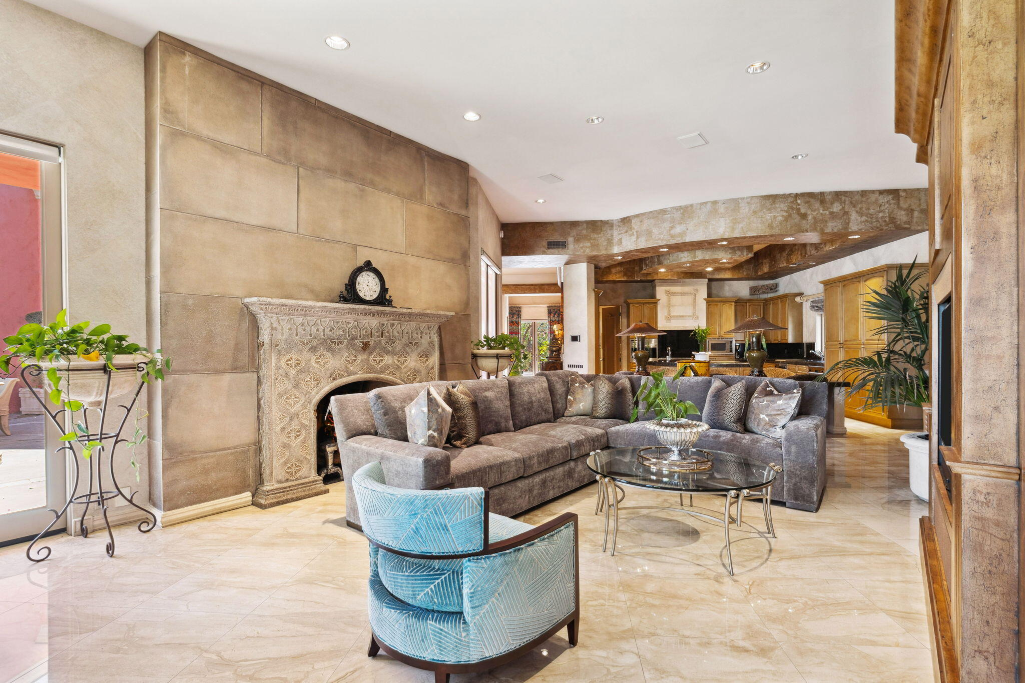 18 Vía Condotti Rancho Mirage, CA 92270 - Photo 46 of 69 a living room with furniture and a fireplace