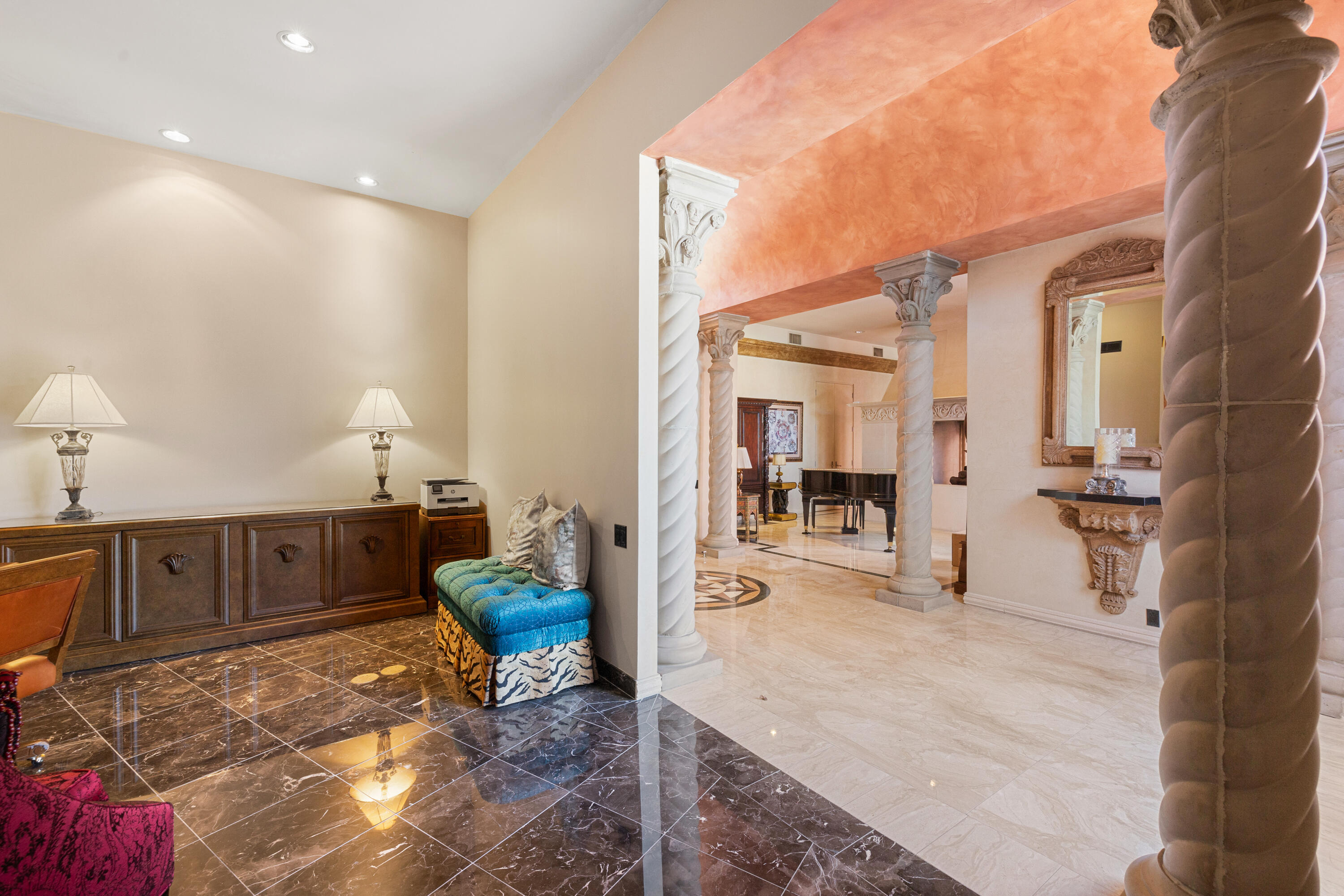 18 Vía Condotti Rancho Mirage, CA 92270 - Photo 6 of 79 a living room with furniture and a chandelier
