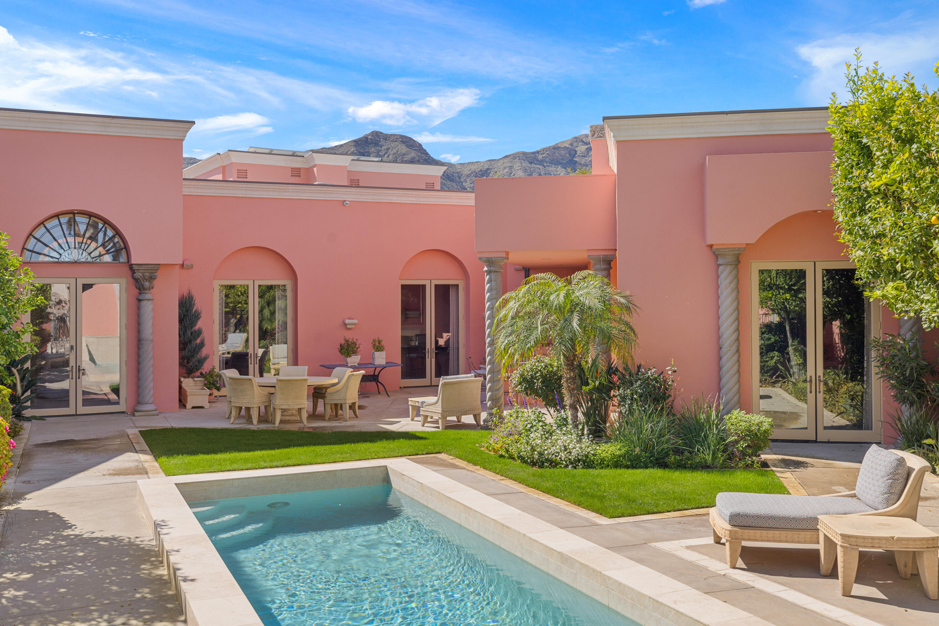 18 Vía Condotti Rancho Mirage, CA 92270 - Photo 71 of 79 a front view of house with yard and outdoor seating