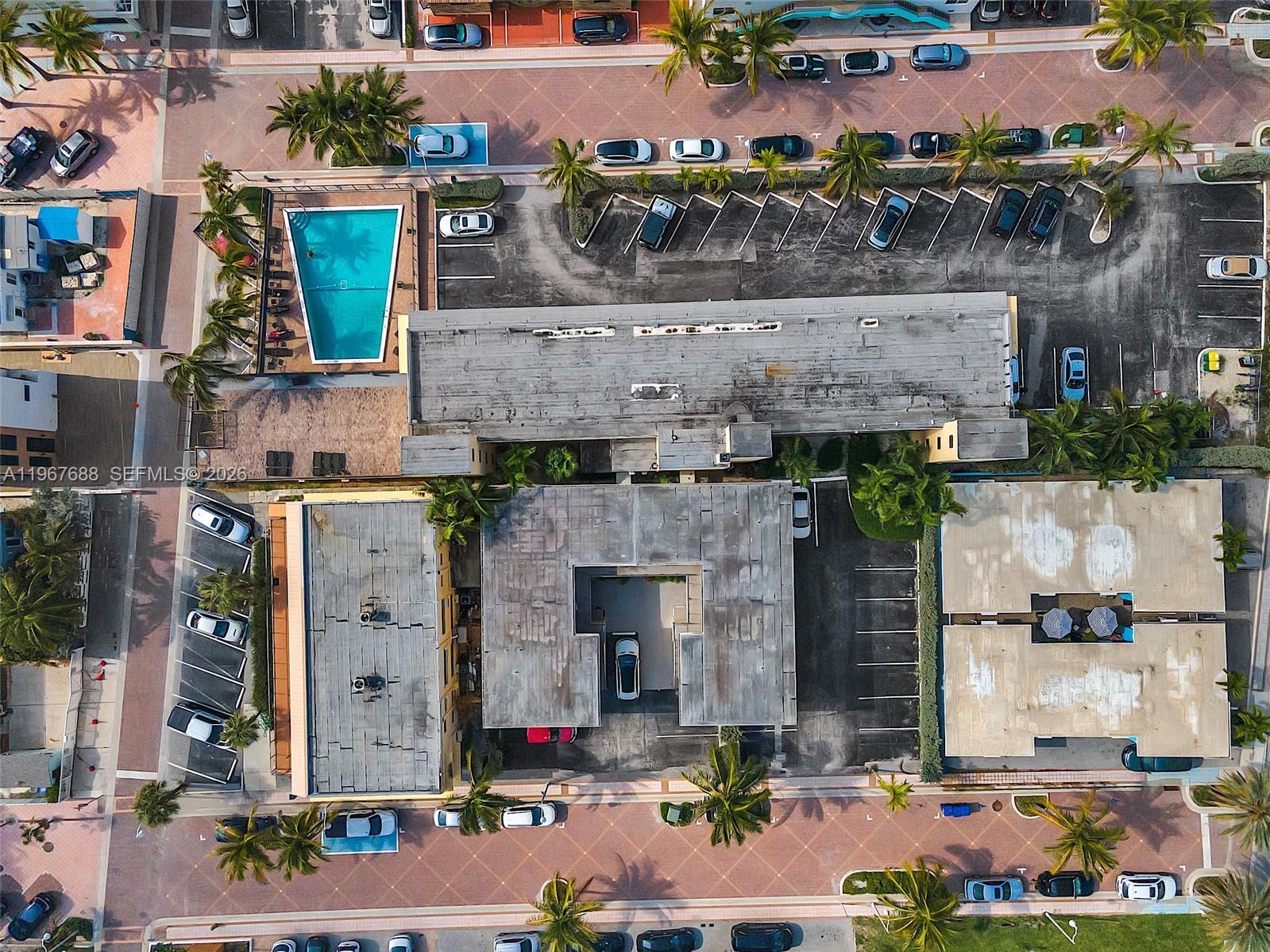 322 Harding Street, Unit B202 Hollywood, FL 33019 - Photo 13 of 39 an aerial view of a house with a yard