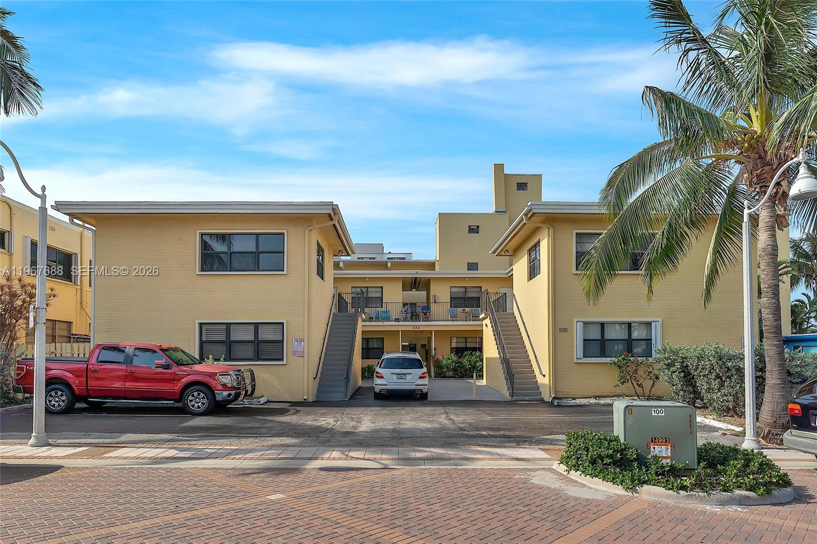 322 Harding Street, Unit B202 Hollywood, FL 33019 - Photo 16 of 39 a view of a street in front of house