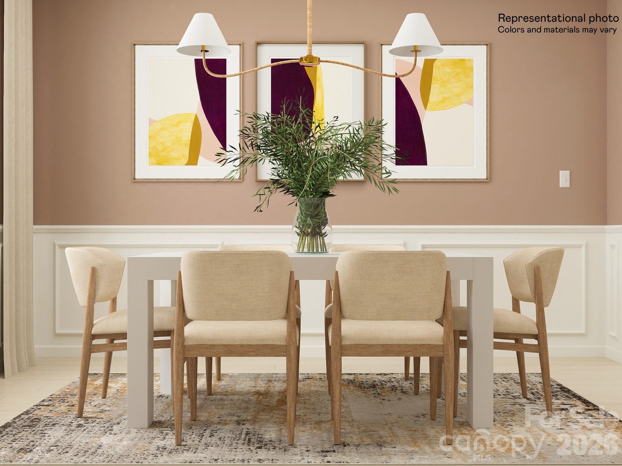 5455 Redbud Road, Unit 53 Lancaster, SC 29720 - Photo 7 of 17 a view of a dining room with furniture and a potted plant