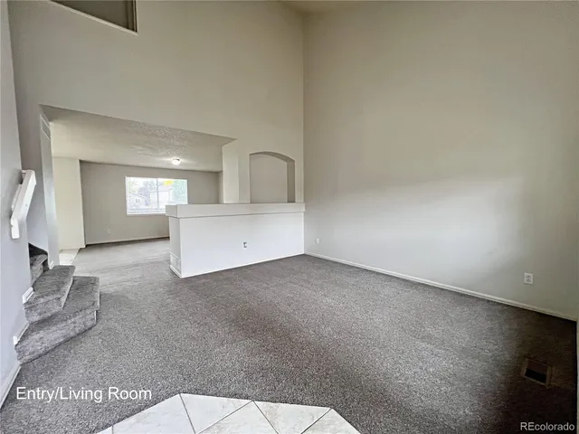 a view of a livingroom with bathroom furniture and a sink