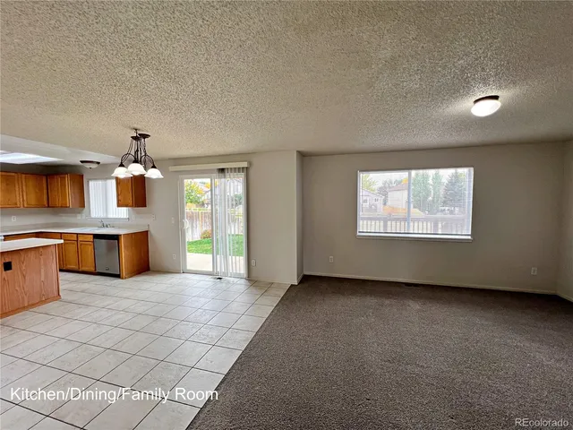a view of a kitchen with a sink