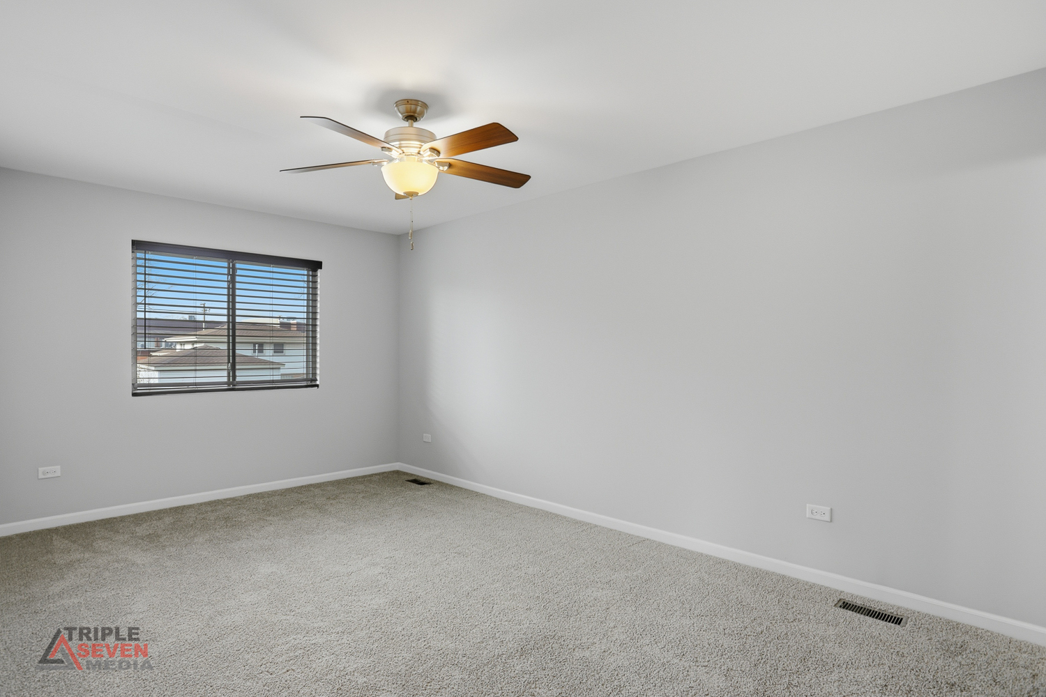 14528 Kolin Avenue Midlothian, IL 60445 - Photo 16 of 29 an empty room with windows and fan