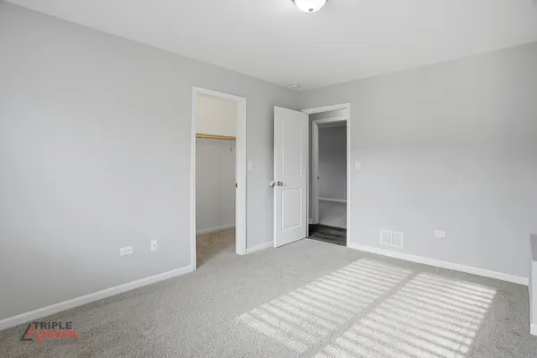 a view of a room with an empty space