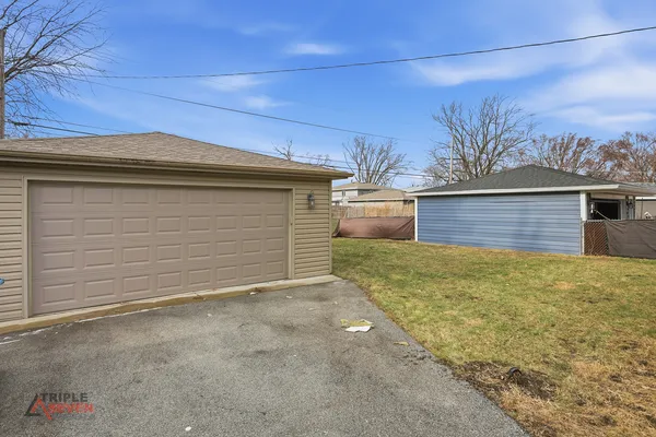 a view of outdoor space and front view of a house