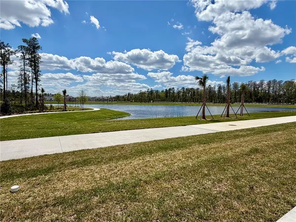 a view of a golf course with a lake