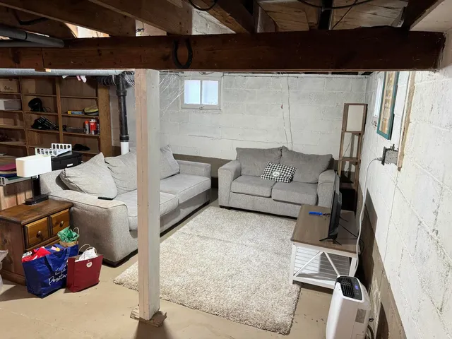 a living room with furniture and a couch