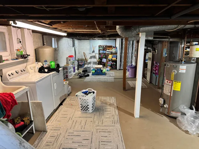 a view of a storage room with furniture and toys